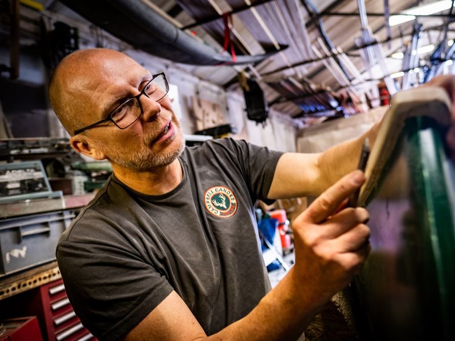 Jason fitting an ash gunwale in the Campbell Canoes workshop