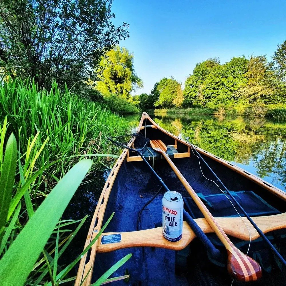On the water, paddle in hand