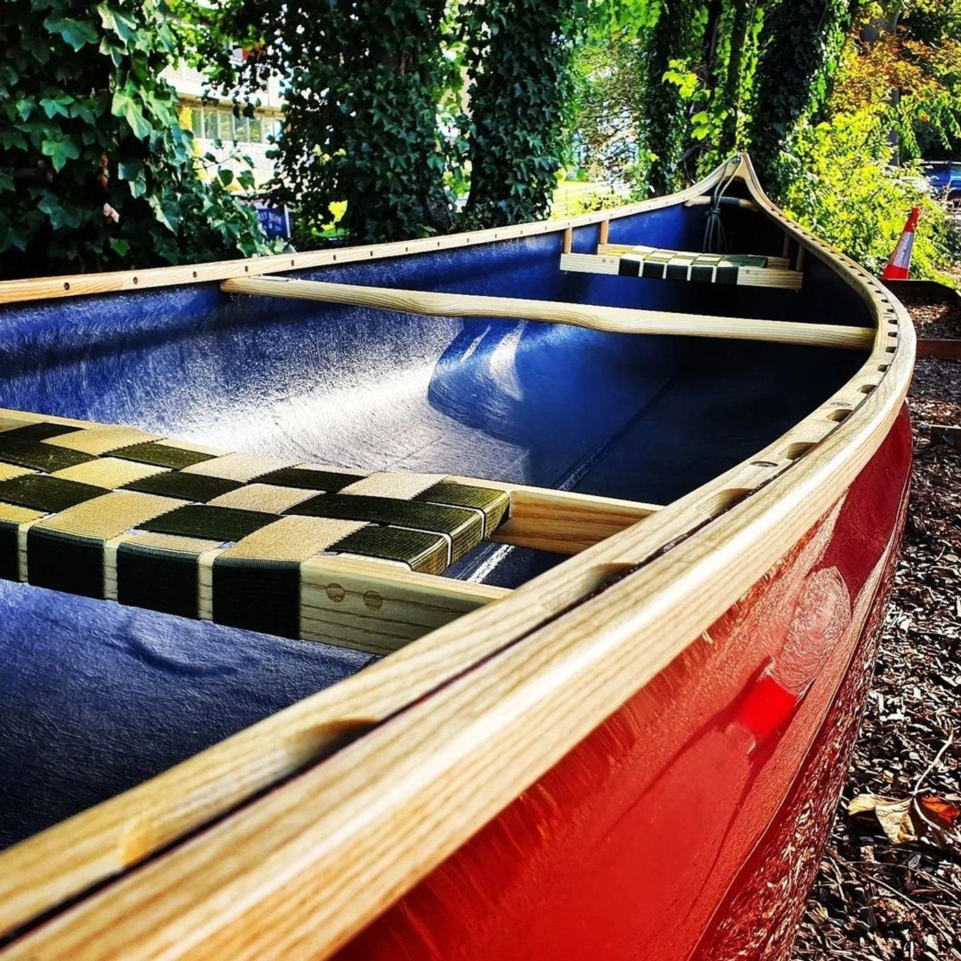 A customer's Campbell Canoe with a checkerboard hull finish