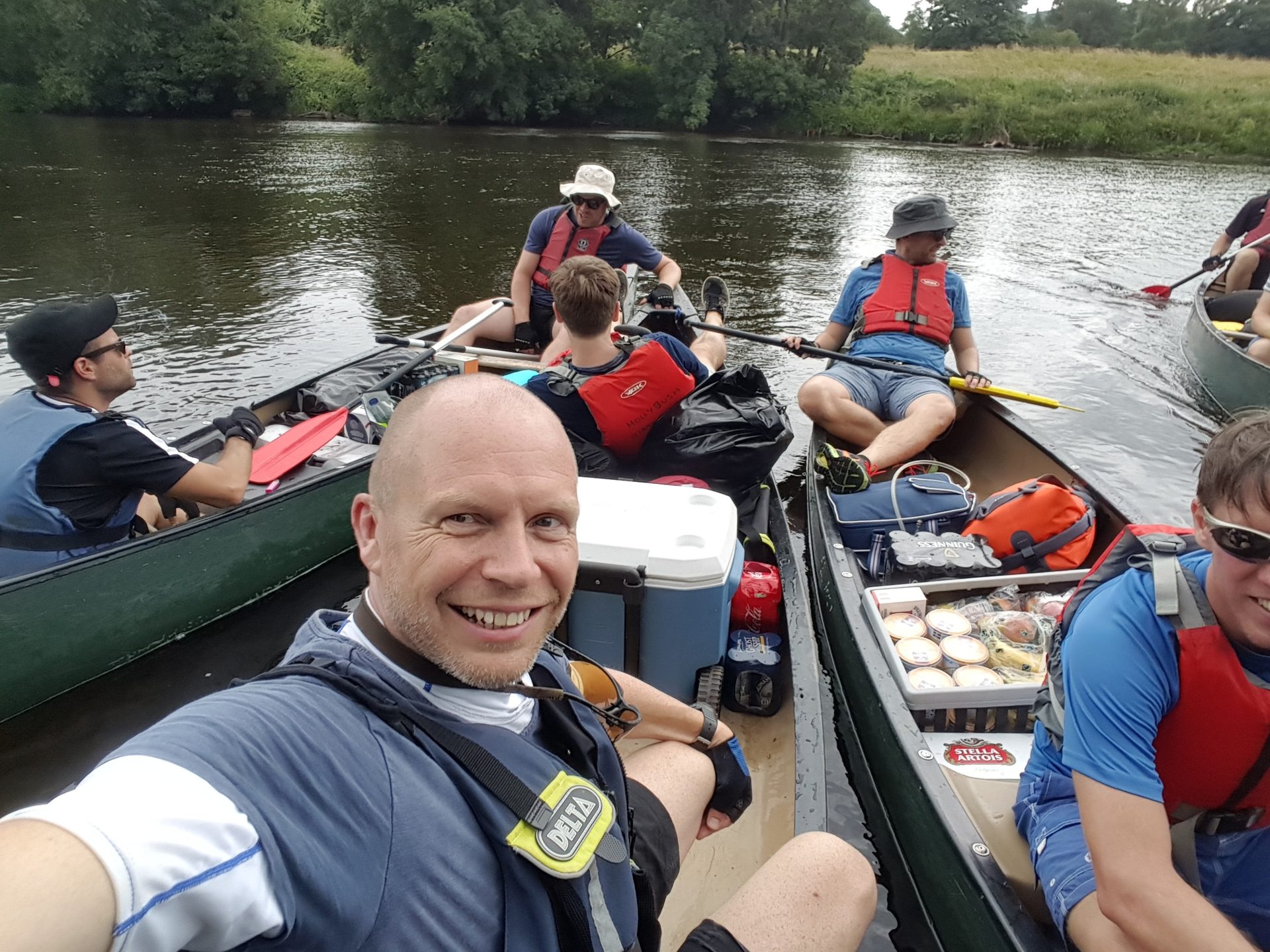 Jason out on the river with friends in Campbell canoes